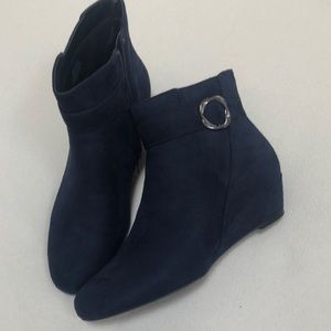 New. Ladies size 9 1/2. Navy blue suede booties.